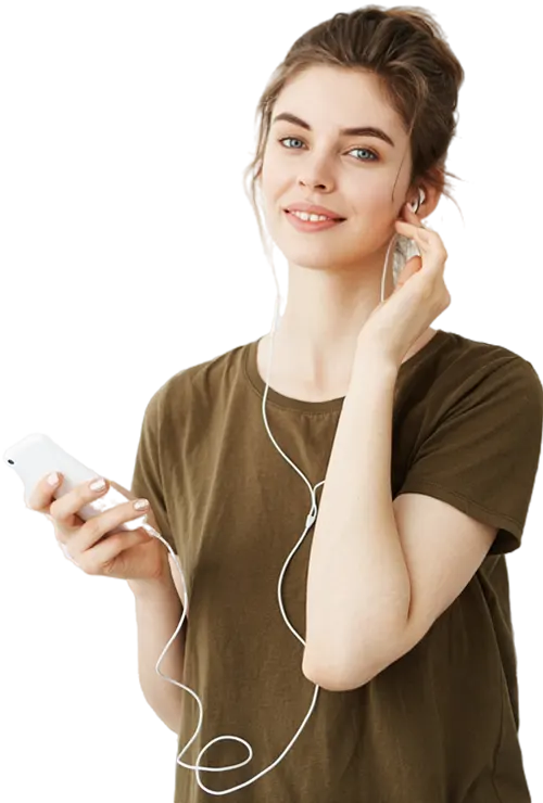 young beautiful woman with bun smiling listening music headphones mobilo copy